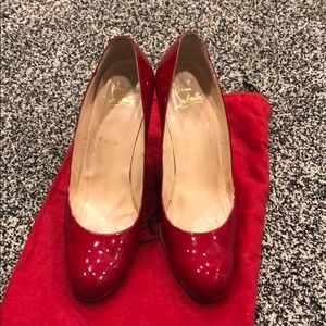 Christian Louboutin red patent wedges